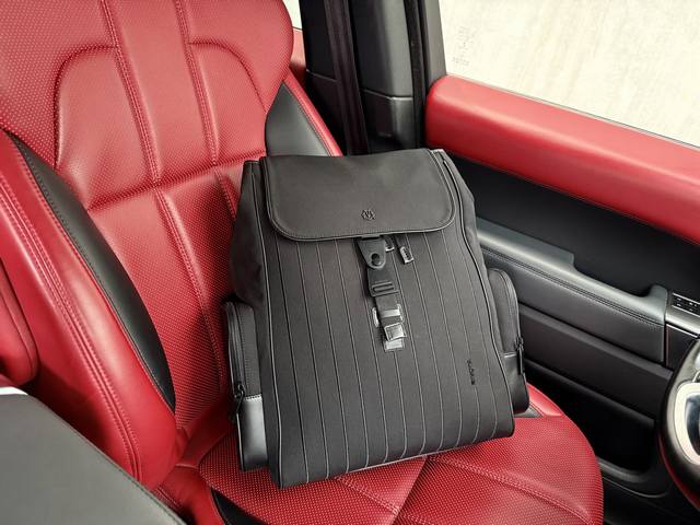 A new high-end Rimowa Never Still backpack. Large, unisex canvas backpack with b