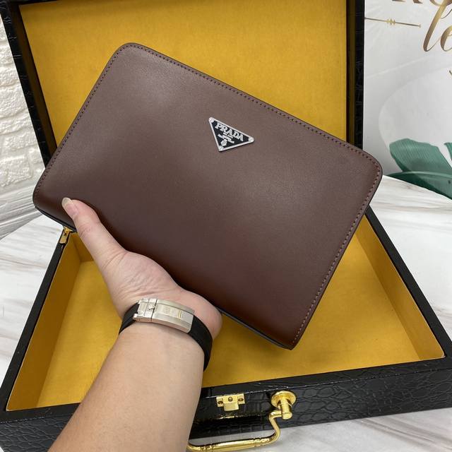 A new, premium, original clutch has arrived. Imported cowhide leather with a sp