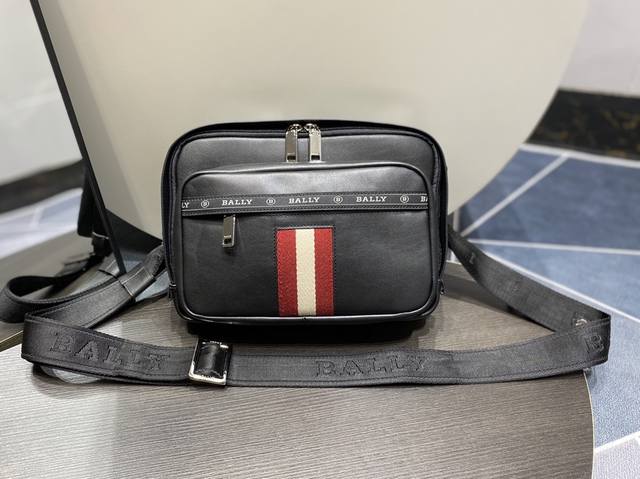 Bally Men's Crossbody Bag Size: 28 x 9 x 20cm. Crafted from top-grain cowhide wi