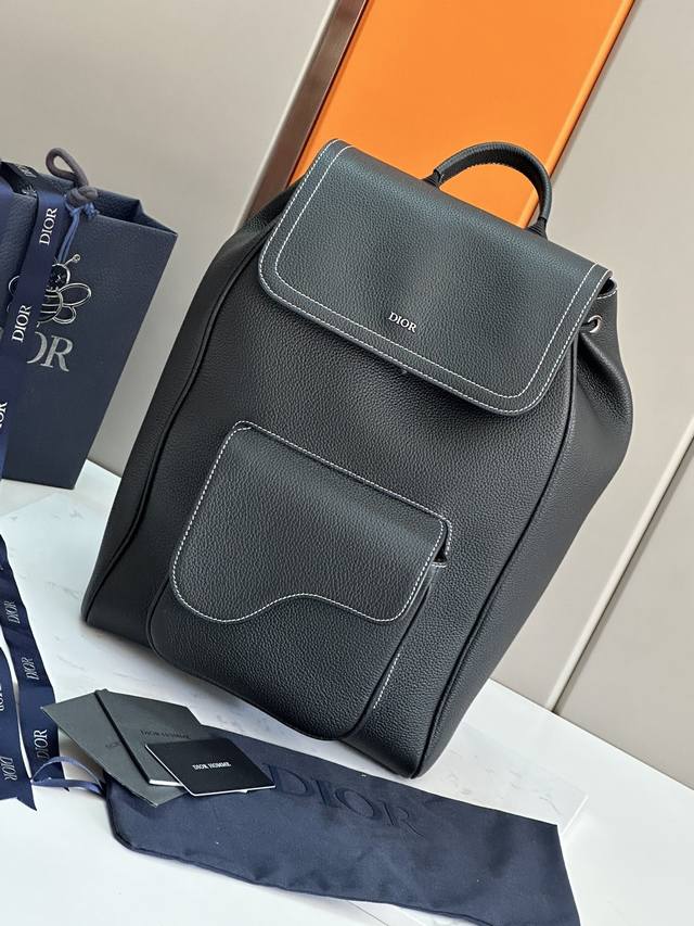 Premium Original This Saddle backpack features a stylish, original design that e