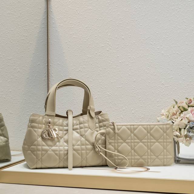 Small size in stock Travel with Toujours. The oversized diamond design and class