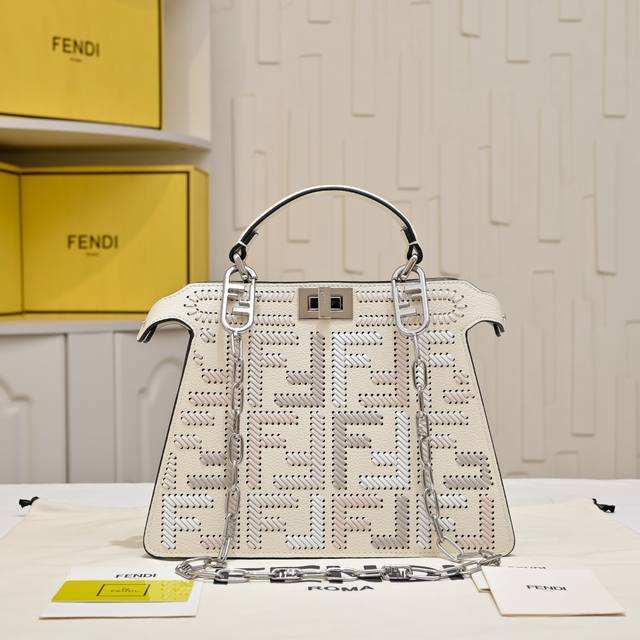 Model 33203 New Arrival -New- The iconic medium Baguette handbag is made of jac