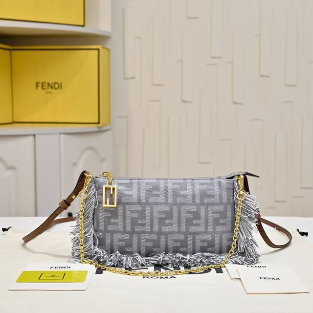 Model 7717 Baguette clutch, denim jacquard material with classic double F Logo,