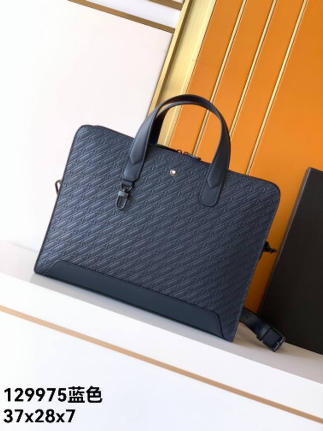Briefcase: 129975# Blue, exclusive top-grain cowhide with embossed pattern. The
