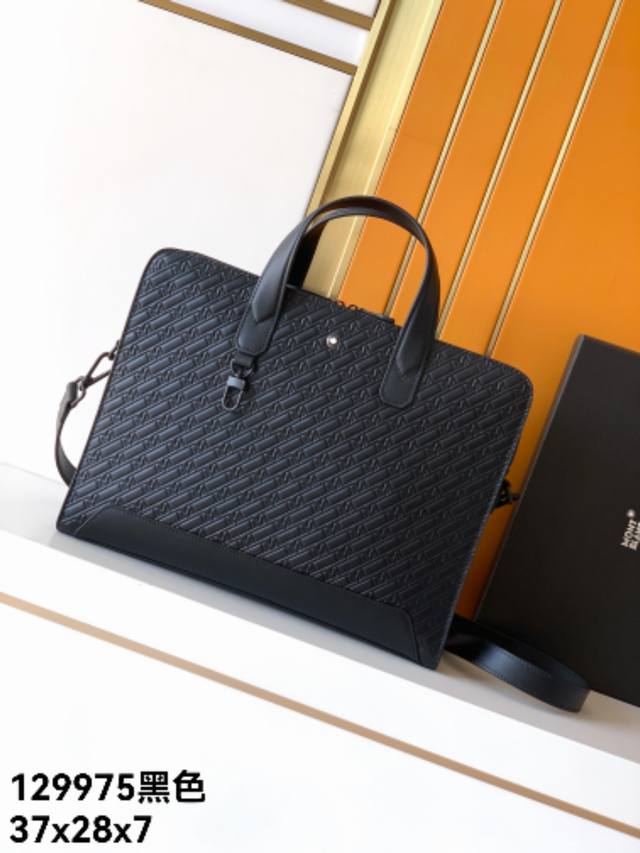 Briefcase: 129975# Black, exclusive top-grain cowhide with embossed pattern. Th