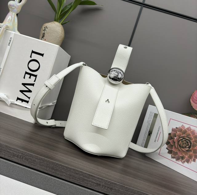LwThe mini soft grained cowhide leather pebble bucket bag cleverly combines pure