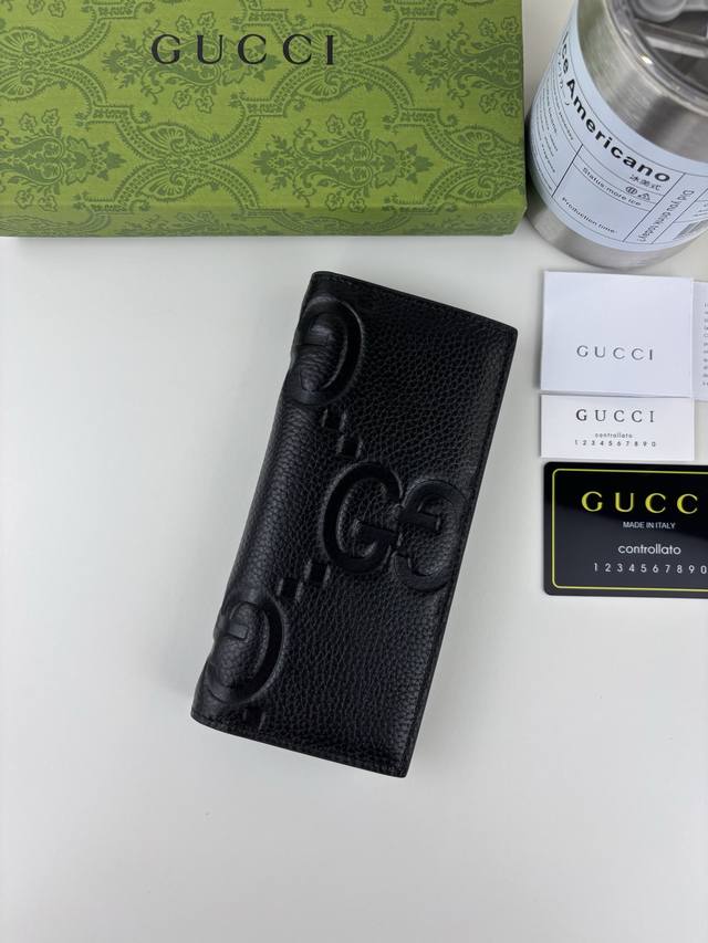 Guccl Super Double G long wallet. The embossed GG print transforms a small every