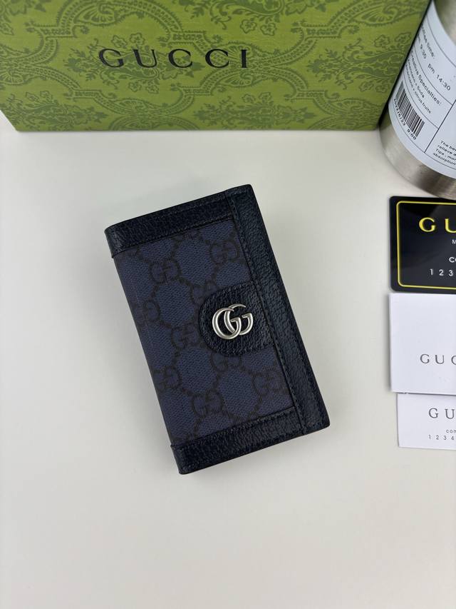 Guccl Ophidia series short wallet. The GG logo is an evolution of the Gucci diam