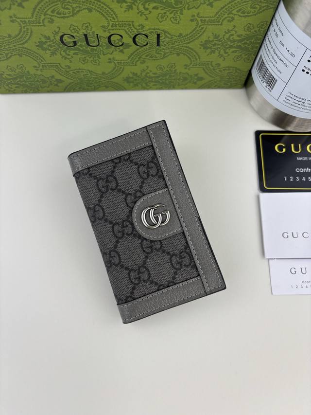 Guccl Ophidia series short wallet. The GG logo is an evolution of the Gucci diam