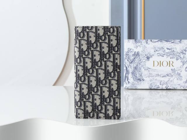 Style 002 Crafted from beige and black Oblique print fabric, this long wallet f
