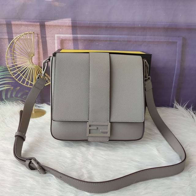 Style No. 7Va537 Baguette medium messenger bag is made of gray lychee leather,