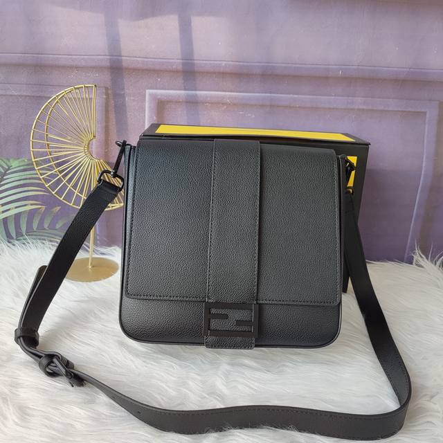 Style No. 7Va537 Baguette Medium Messenger Bag is made of black lychee leather