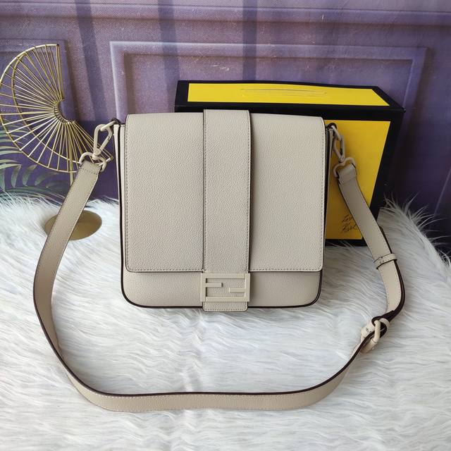 Style No. 7Va537 Baguette Medium Messenger Bag is made of off-white lychee leat