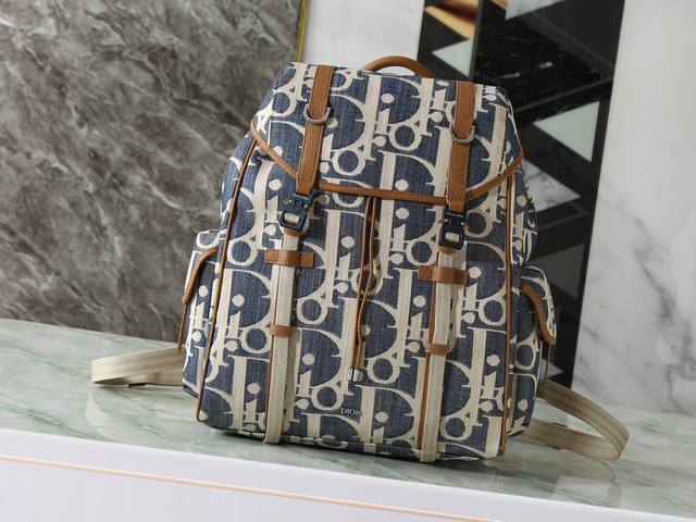 This Dior Hit The Road backpack with flap combines modern style with Dior's cout