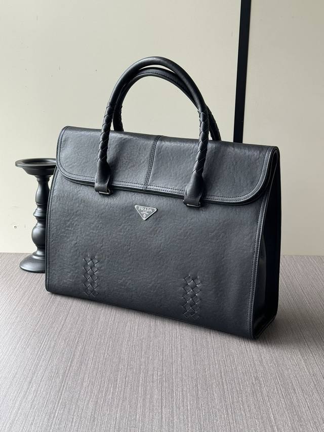 Photos are in stock. A high-end, top-tier Prada handbag is shipping in bulk. We