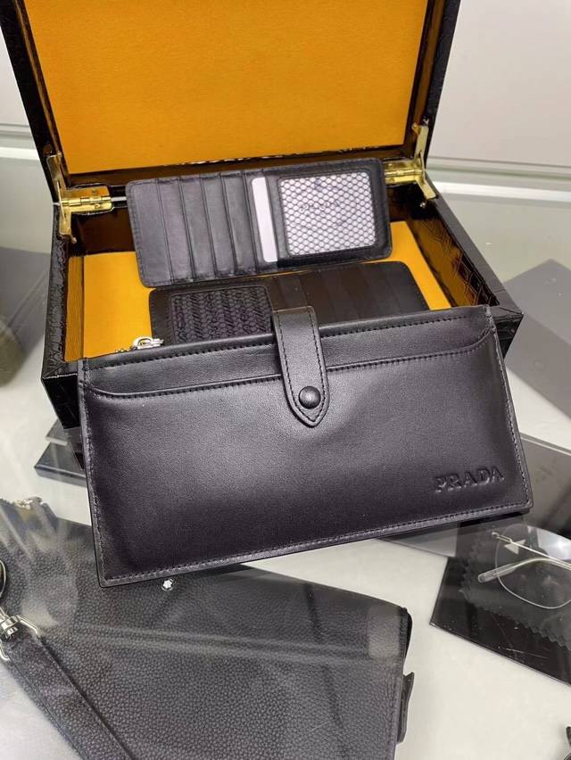 Bestseller, top-tier, original Prada multi-function card holder. Holds 24 cards