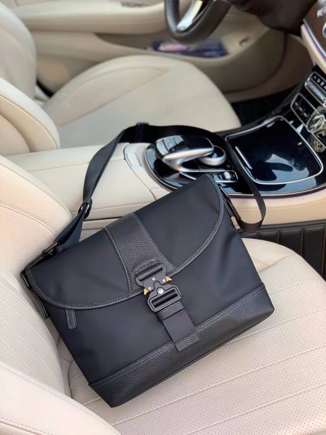 A must-have Dior bag. Custom-made with imported Italian cloth and cowhide, the