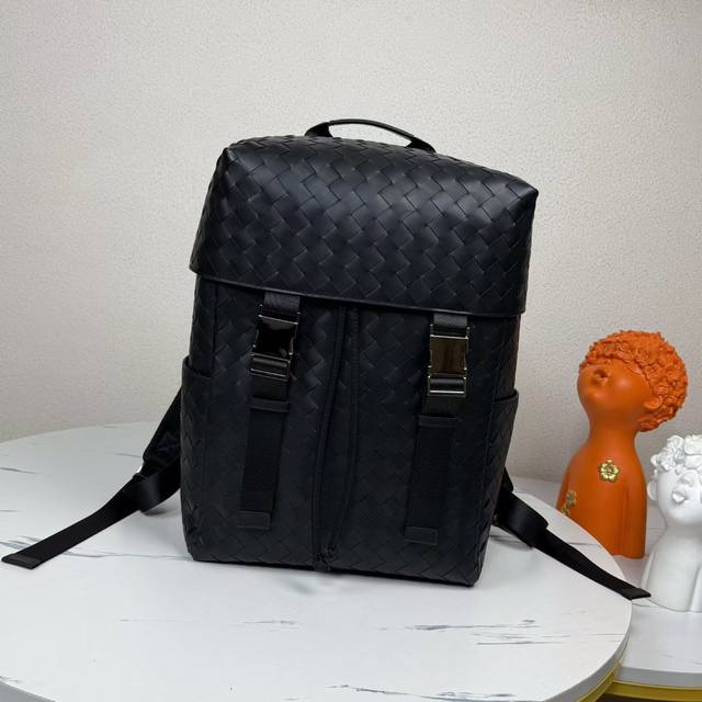 Bv's new woven flip-top backpack, this minimalist black backpack is truly luxuri