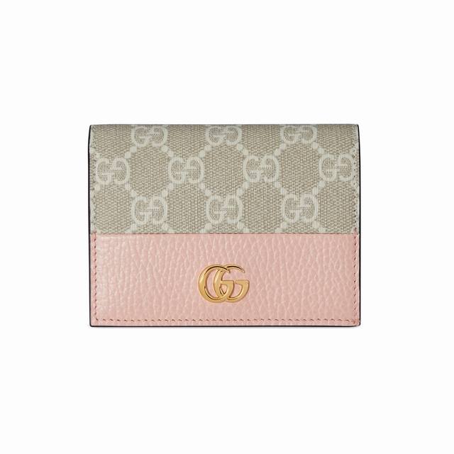 This top-of-the-line card holder features a mix of the brand's classic monogram