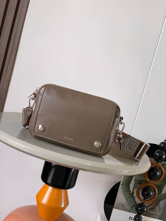 Small soft grained cowhide pebble messenger bag The pebble messenger bag feature