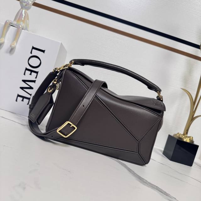 Low The new small nappa leather Featherlight puzzle bag features a rectangular s