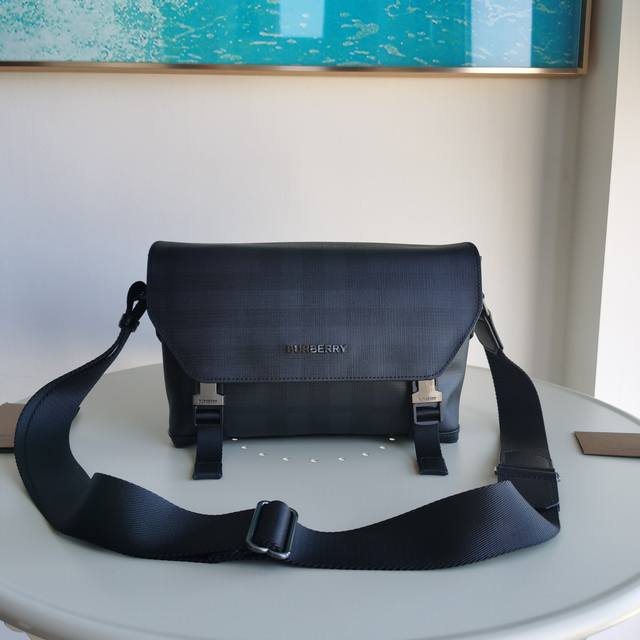 This premium-quality, original leather Burberry-style messenger bag features th