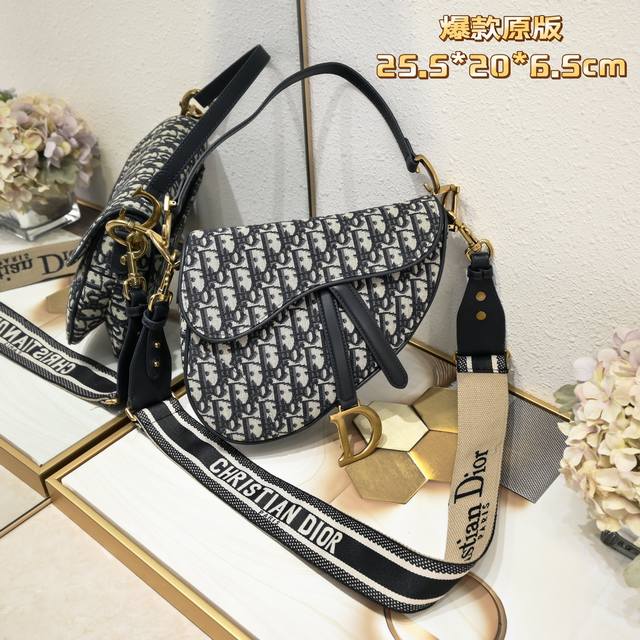 Large webbing shoulder strap with matching hardware and box. The highest-end ver