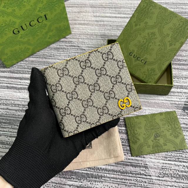 Wallet with Gg Supreme details. Gucci's small leather accessories push the boun