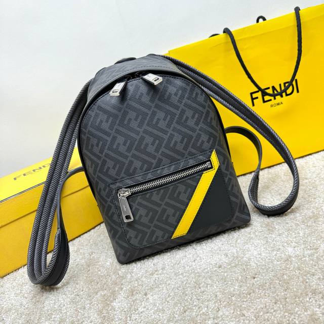 Small structured backpack. This design features a metal rivet engraved with the
