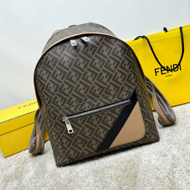 A spacious, structured backpack. This design features a metal rivet engraved wit