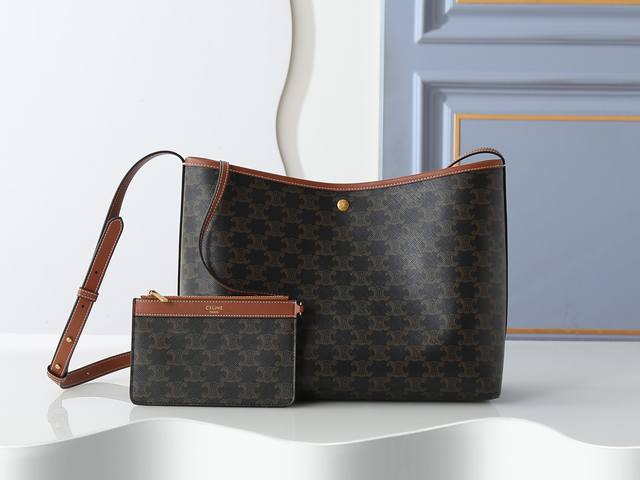Model No. 123912 Monogram soft silhouette handbag, Triomphe snap button closure