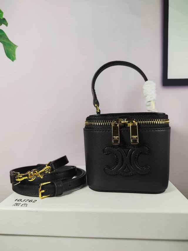 Style No. 10J762 Black, mini smooth cowhide cosmetic bag, zipper closure, adjus