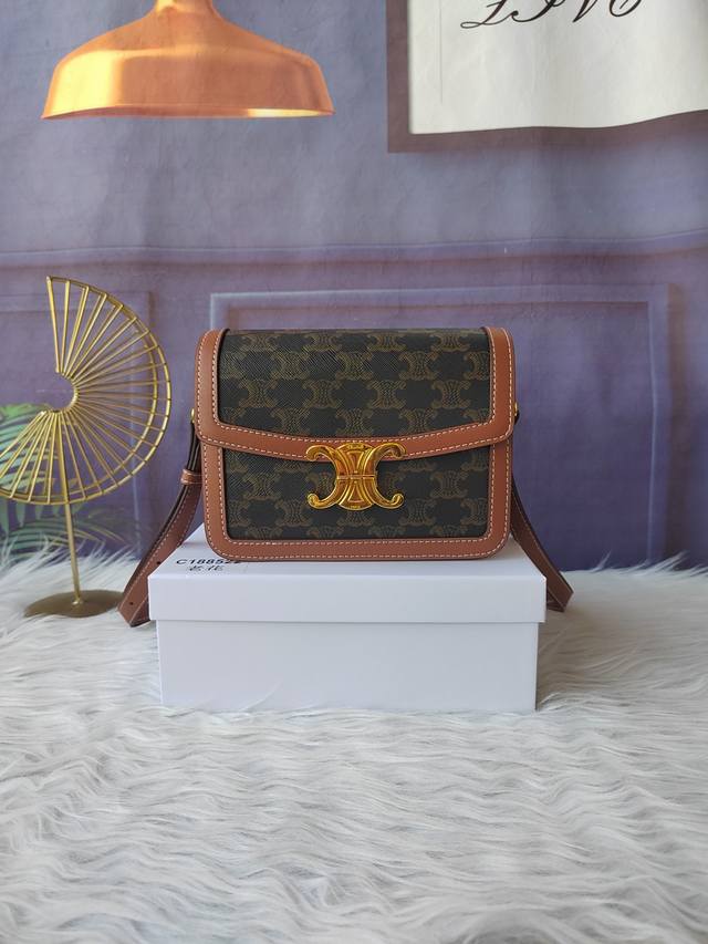 Model number C188522 Triomphe small handbag with monogram, comes with an adjust
