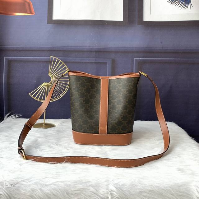 Style No. C191442 Small logo print bucket bag, artificial leather cowhide, cabi