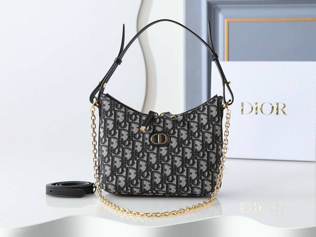 Style number S5253 is carefully crafted from black Oblique printed fabric and o