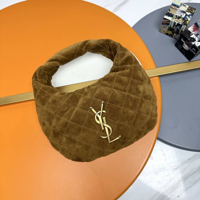 Frosted brown and gold Icare Baby suede handbag. This highly anticipated croissa