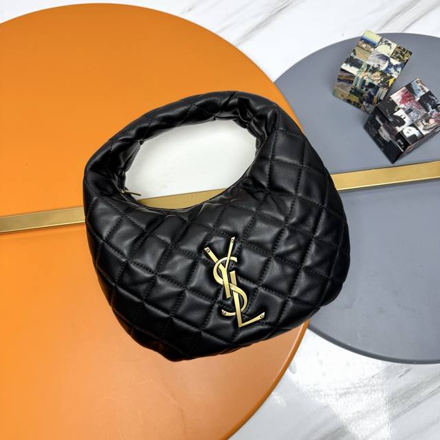 Black Lambskin and Gold Icare Baby Nappa Lambskin Handbag. This highly anticipat