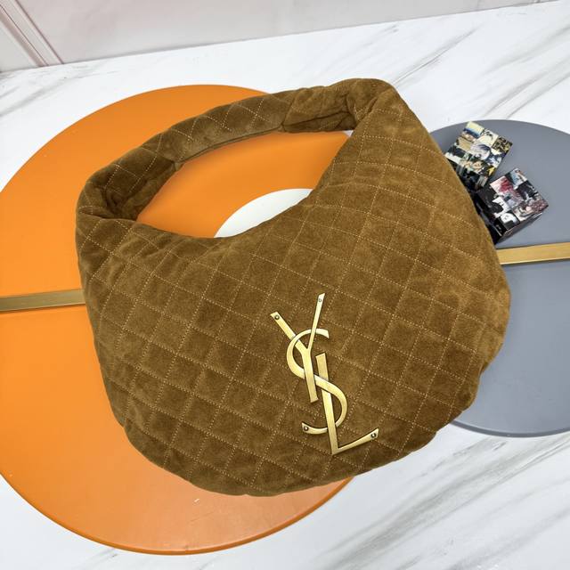 Frosted Brown and Gold The new Icare Baby suede handbag makes a dazzling debut i