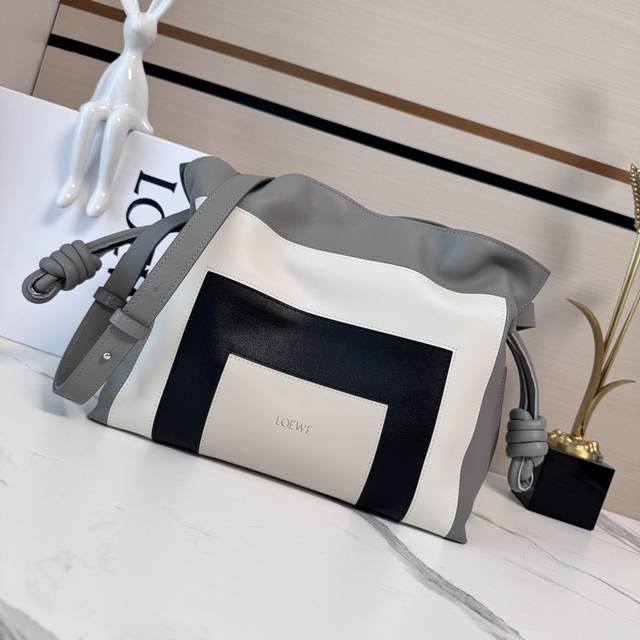 Lw The new Flamenco Lucky Bag features a relaxed style crafted from soft materia