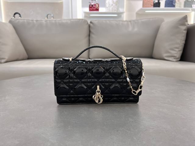 0980 Black Lambskin Patent Leather Lady Dior Pearl Clutch This clutch is a new a