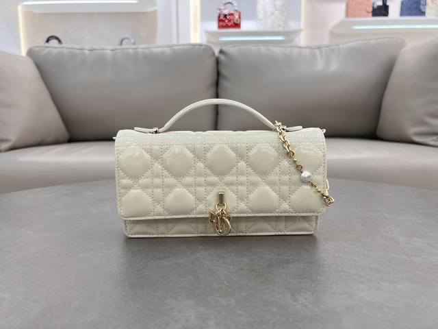 0980 White Lambskin Patent Leather Lady Dior Pearl Clutch Bag. This new season c