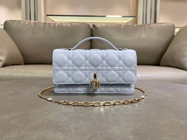 0980 Light Blue Lambskin Lady Dior Pearl Clutch Bag. This new season clutch feat