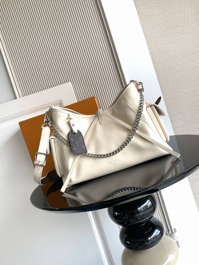 Perfect Match Lambskin Leather Premium Dynamic Chip This small handbag features