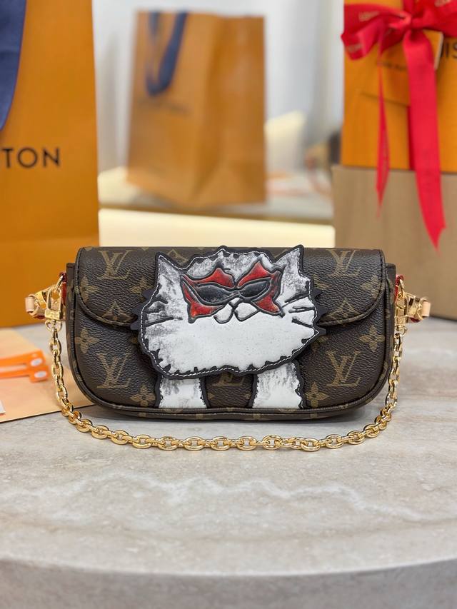 M15148 The Lv Travels With Grace Coddington collection introduces this Wallet On