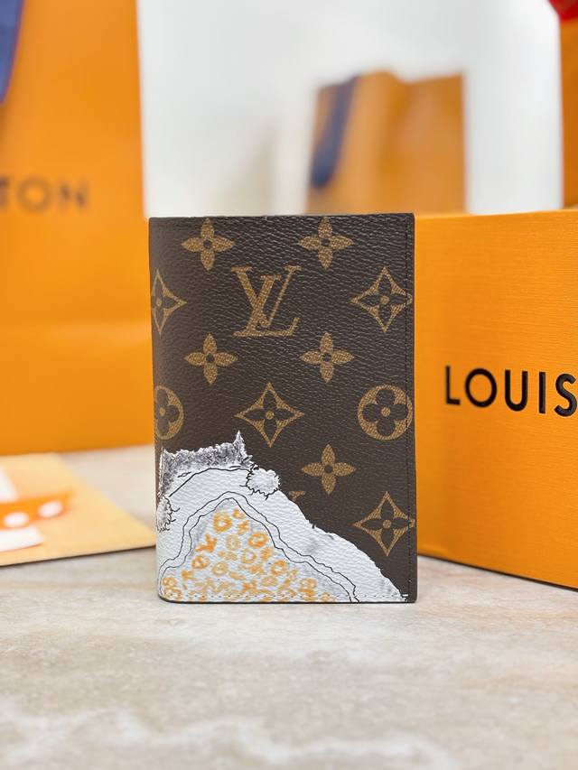 M25753 This passport holder is crafted from Monogram canvas and features hand-dr