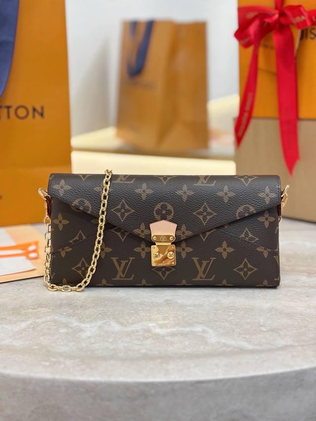 M15150 Lv's "Elegance on the Go" Coddington collection showcases this playful "o