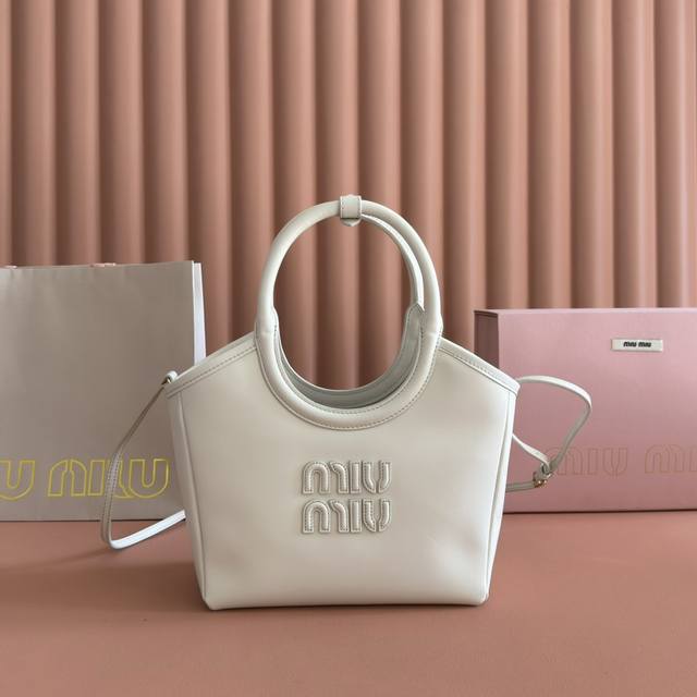 Comes with full boutique packaging. The new Miu Ivy handbag features simple line