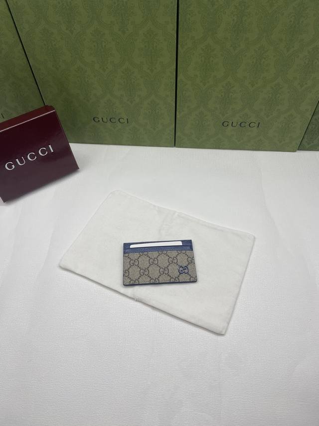 Premium genuine leather card holder with green box packaging! Crafted from beige