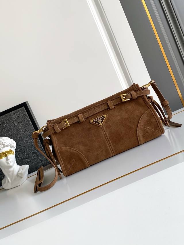 New Lussolf Suede Crossbody Bag. This crossbody bag features a soft silhouette m