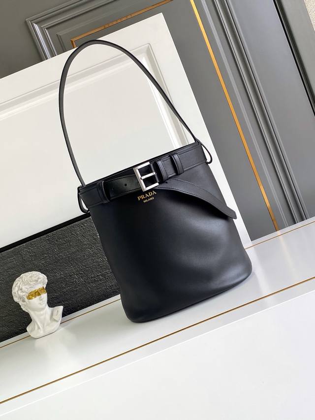 New Bucket Bag This stylish bucket bag offers a fresh take on the Buckle handbag